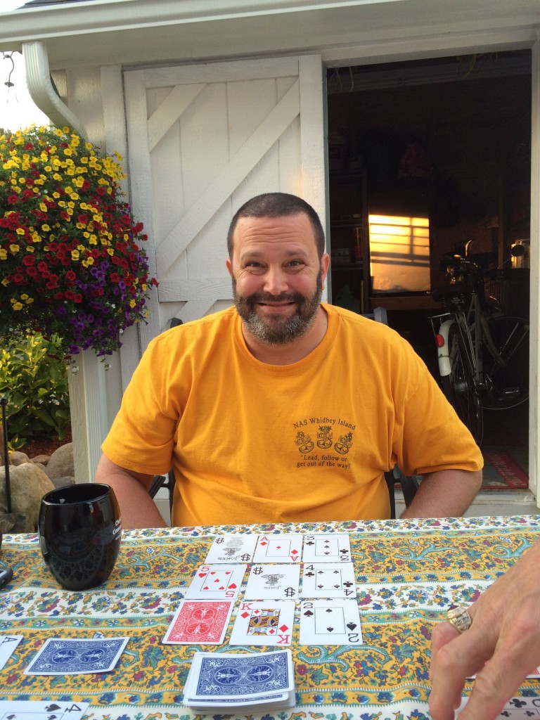 We played a lot of cards with friends, and with family, too! Here's Brian ... can't tell if that's a winning or losing face!