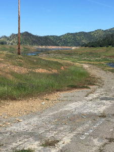 Access road to hatchery state housing and Moccasin Creek prior to the construction of the new Don Pedro Dam.